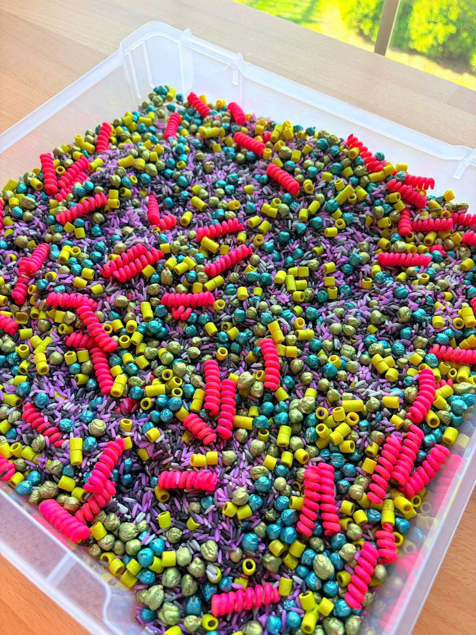 Purple colorful sensory bin